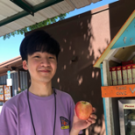Cooper Owyang holding up an apple